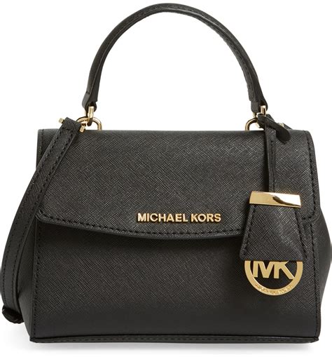 Michael Kors three pocket handbags